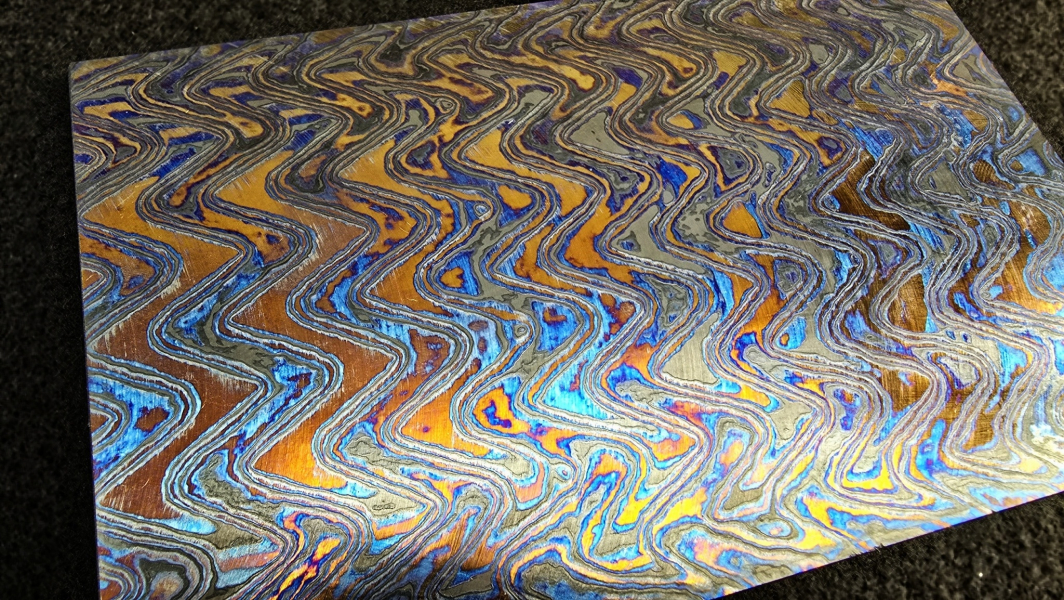 4.5 x 85 x 135 mm FF Rainbow-Zr flat - Arrowz patt. - Zirconium damascus