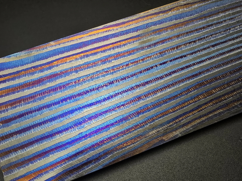 3.3 x 57 x 180 mm FF Rainbow-Zr flat - Kant patt. - Zirconium damascus